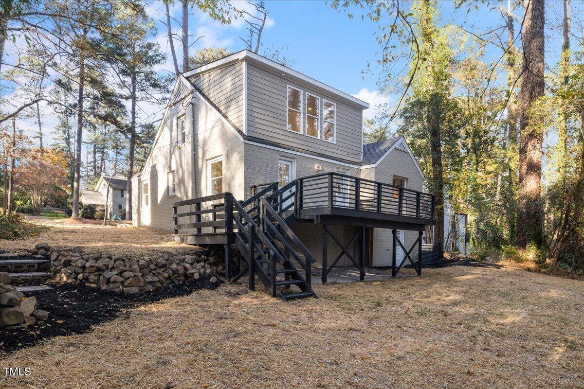 2703 Augusta Drive Durham, NC 27707 - Photo 42 of 45 a view of a house with a yard and sitting area