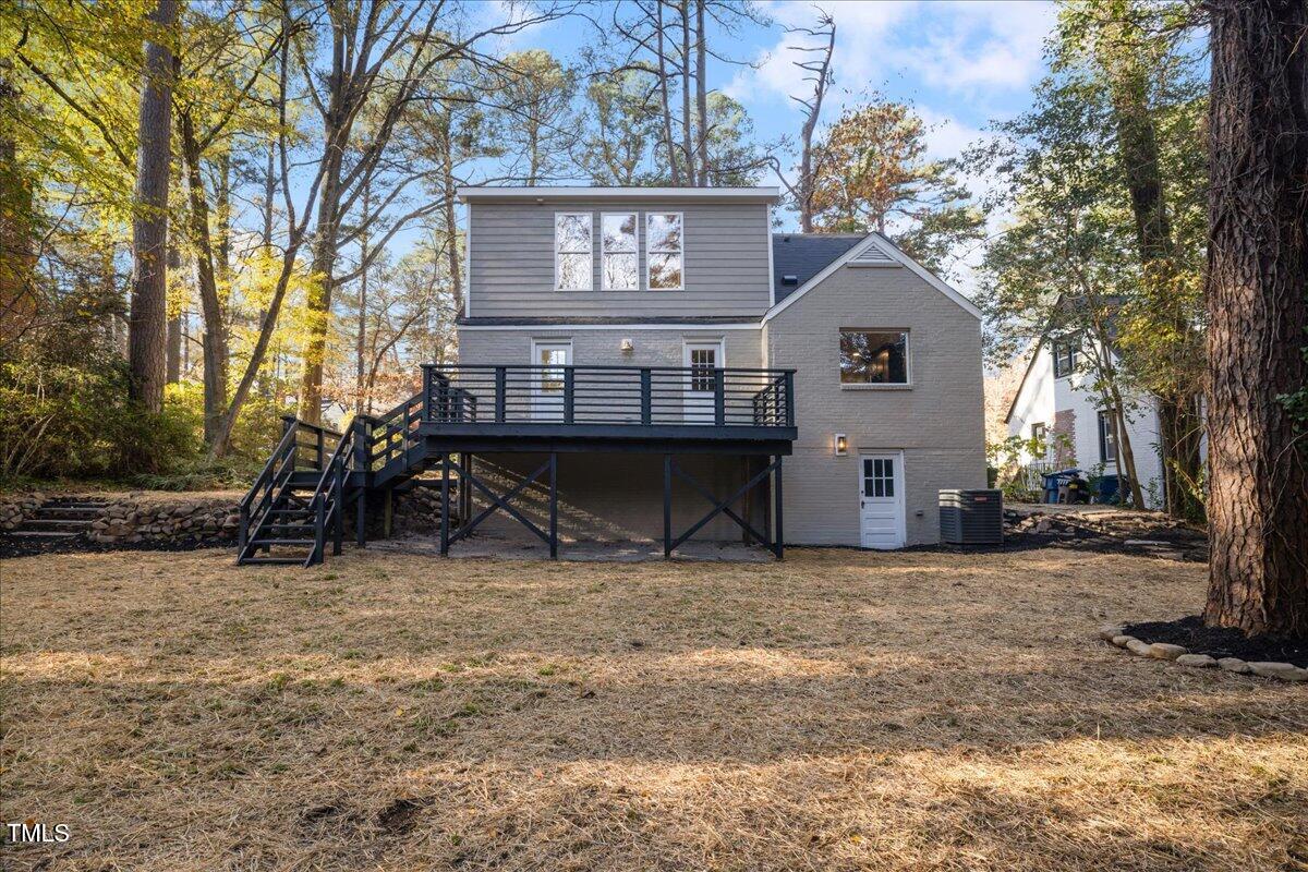 2703 Augusta Drive Durham, NC 27707 - Photo 43 of 45 a view of a house with a large tree and a big yard