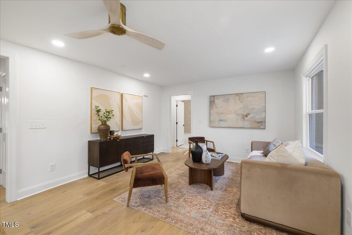 2703 Augusta Drive Durham, NC 27707 - Photo 6 of 45 a living room with furniture and a window