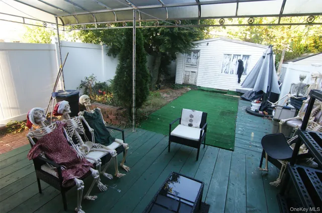 a view of yard with outdoor seating