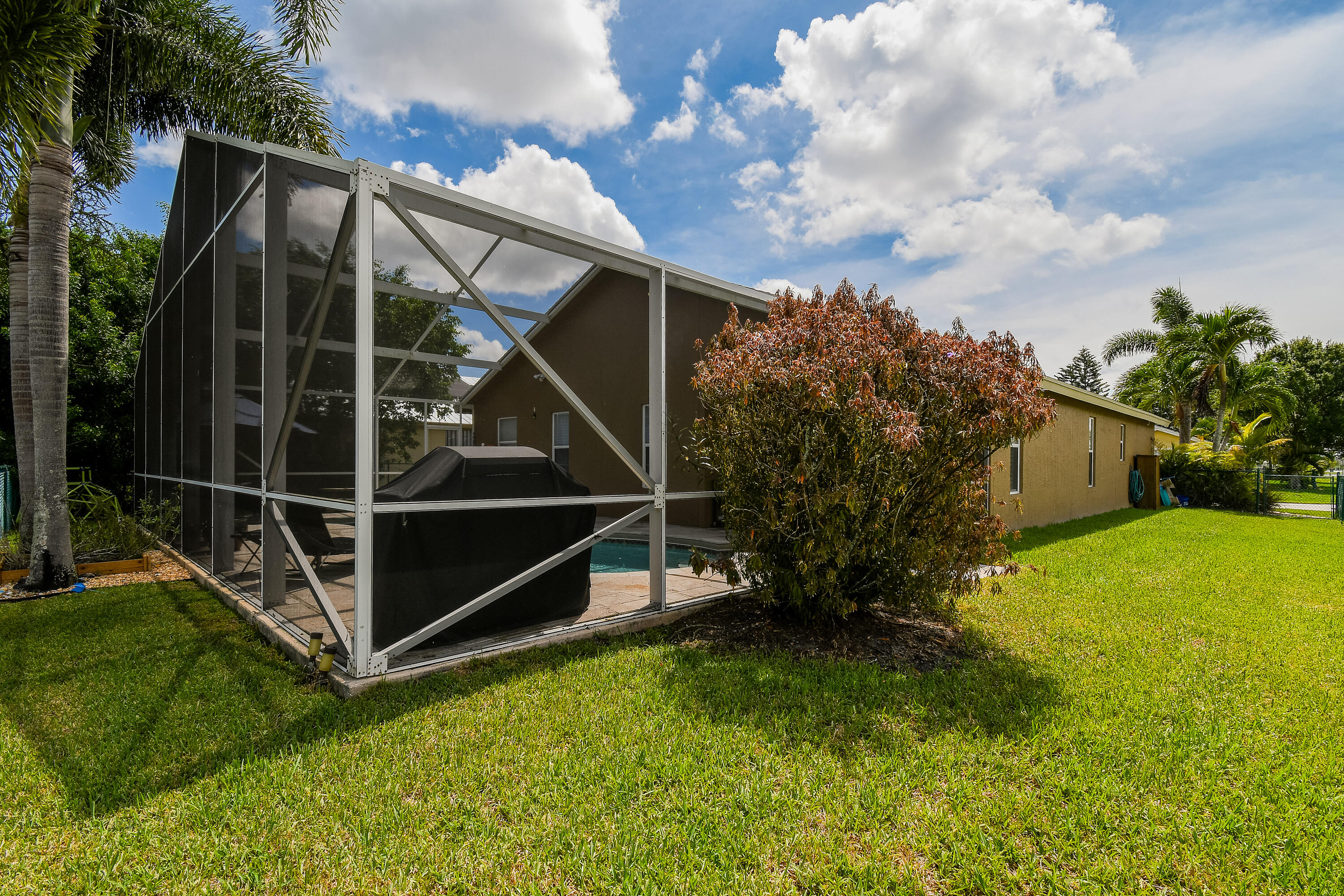 2609 Southwest Regency Road Stuart, FL 34997 - Photo 45 of 57 Side Yard