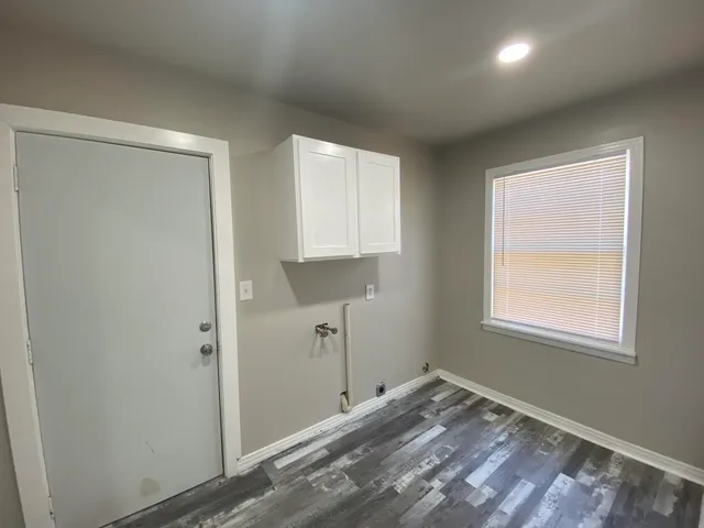 a view of a room that has a window in it