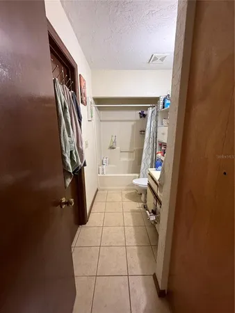a bathroom with a sink and a shower