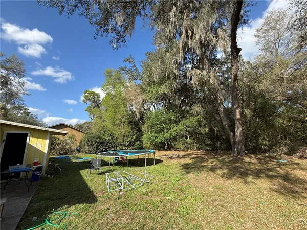 a view of swimming pool with chairs