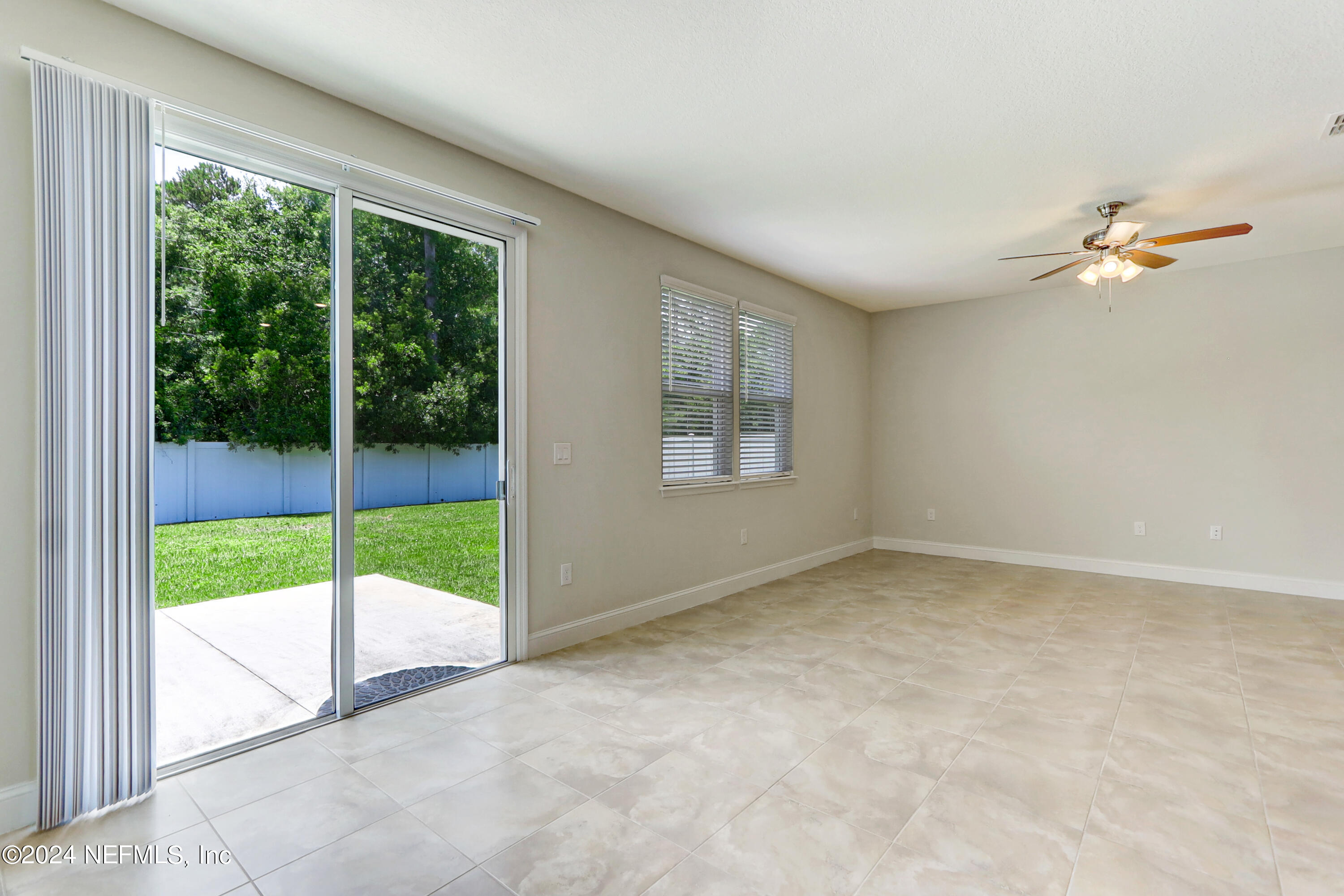 14454 Spring Light Circle Jacksonville, FL 32226 - Photo 14 of 37 a view of an empty room with a balcony