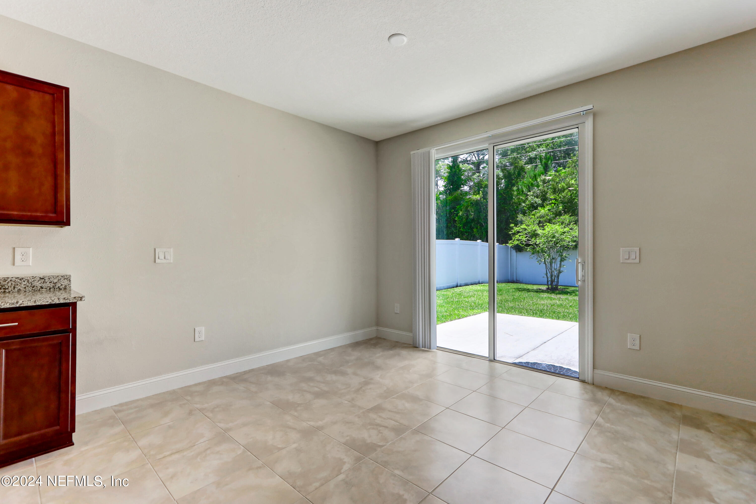 14454 Spring Light Circle Jacksonville, FL 32226 - Photo 15 of 37 a view of an empty room with a window