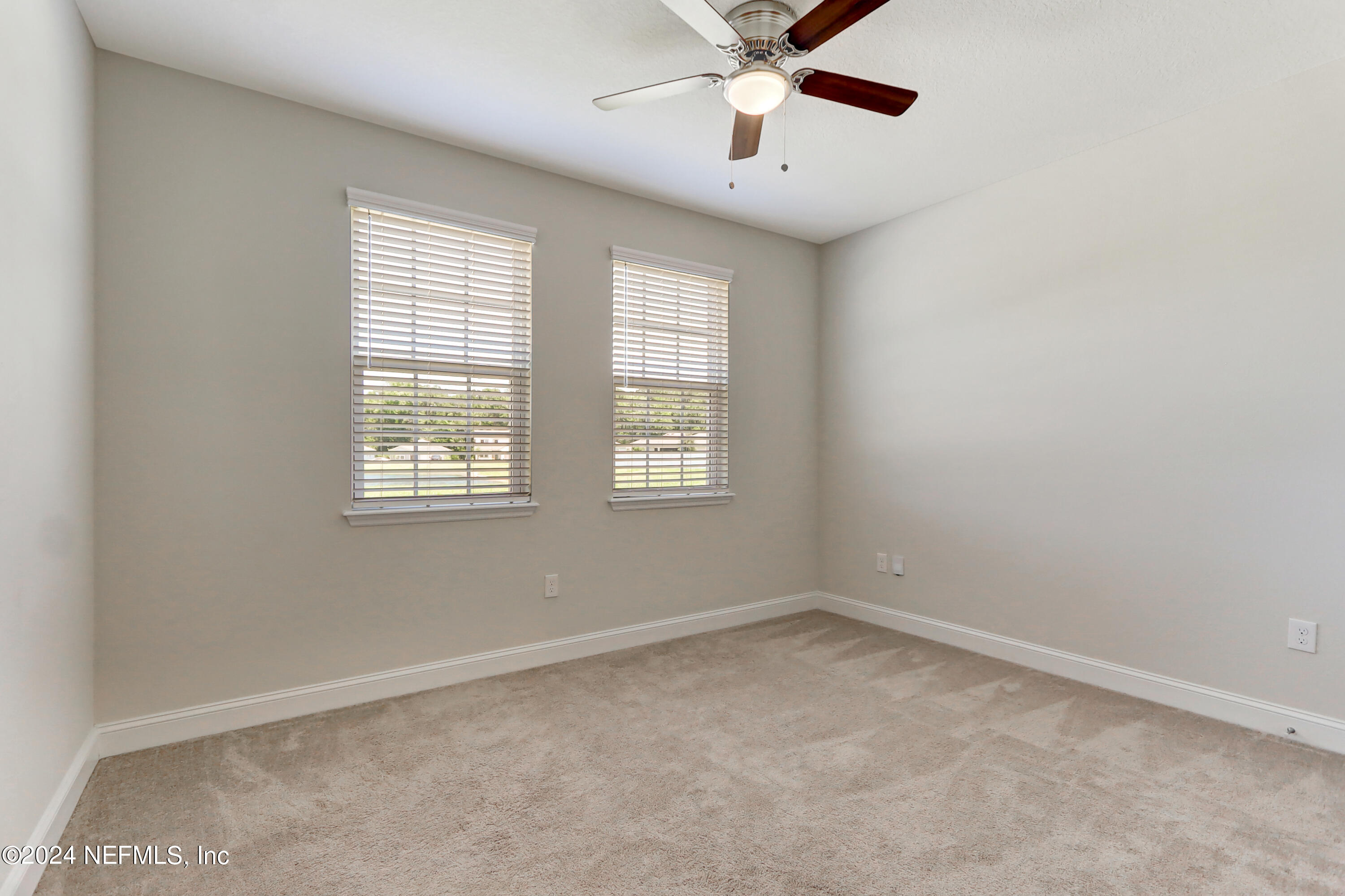 14454 Spring Light Circle Jacksonville, FL 32226 - Photo 29 of 37 an empty room with a window