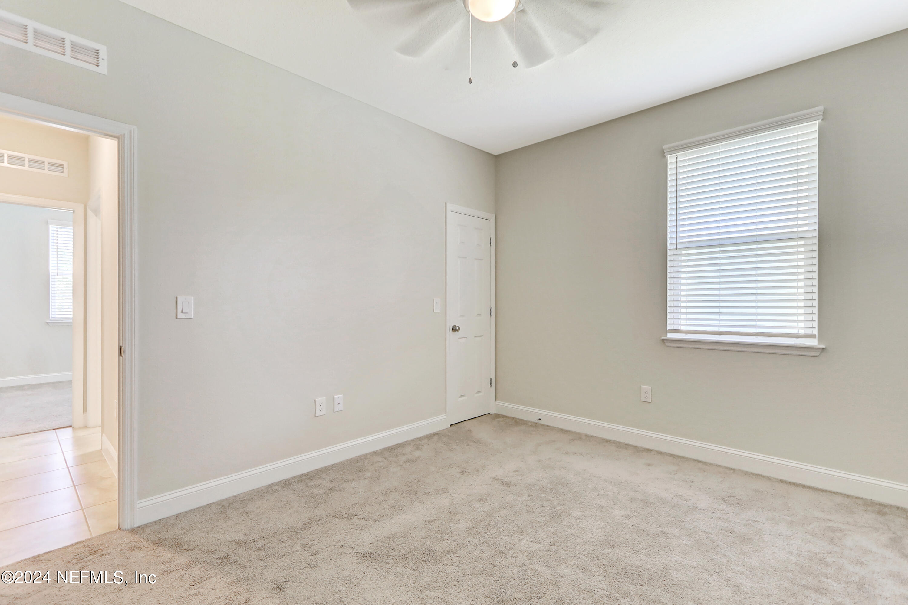 14454 Spring Light Circle Jacksonville, FL 32226 - Photo 33 of 37 an empty room with a window
