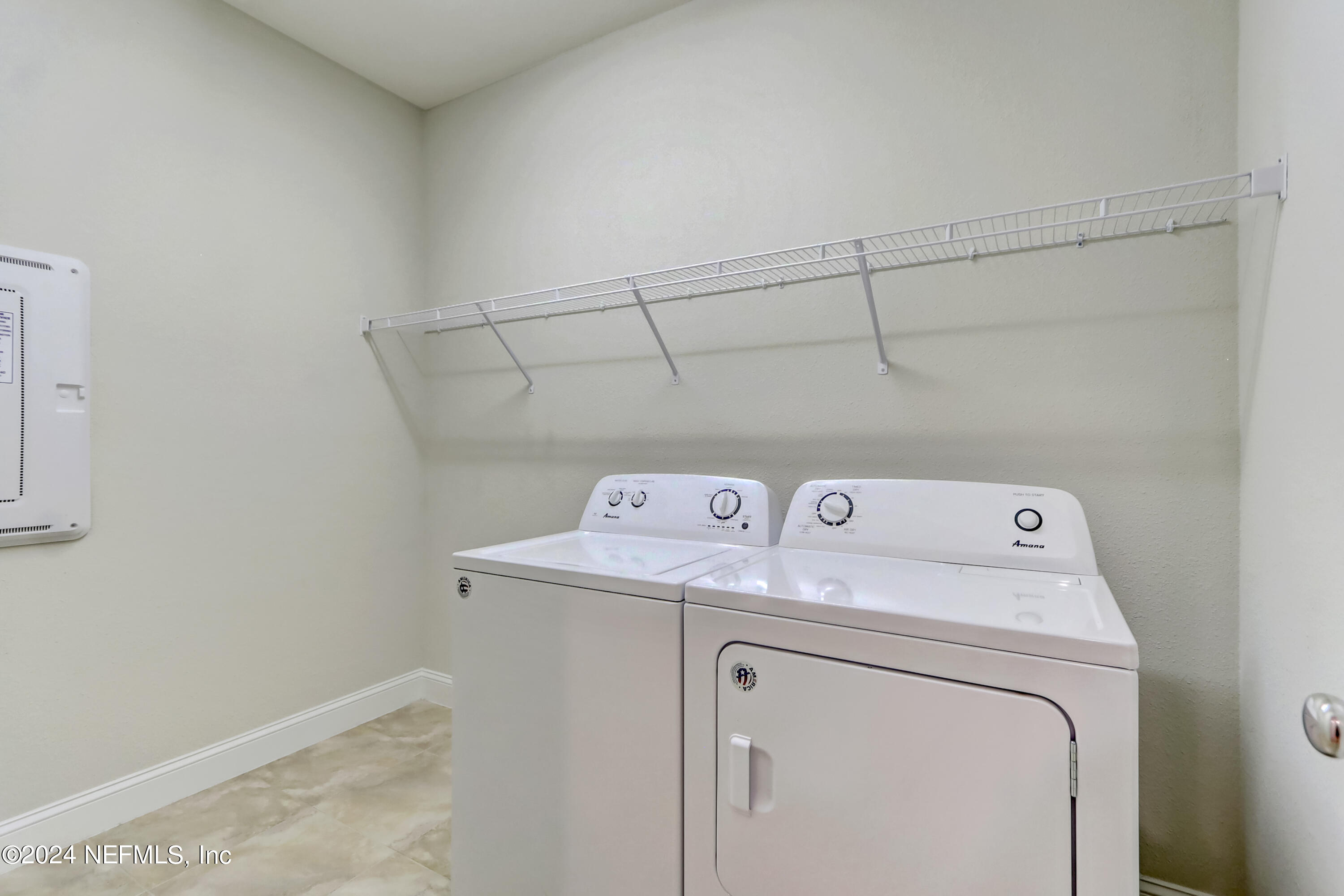 14454 Spring Light Circle Jacksonville, FL 32226 - Photo 34 of 37 a utility room with dryer and washer