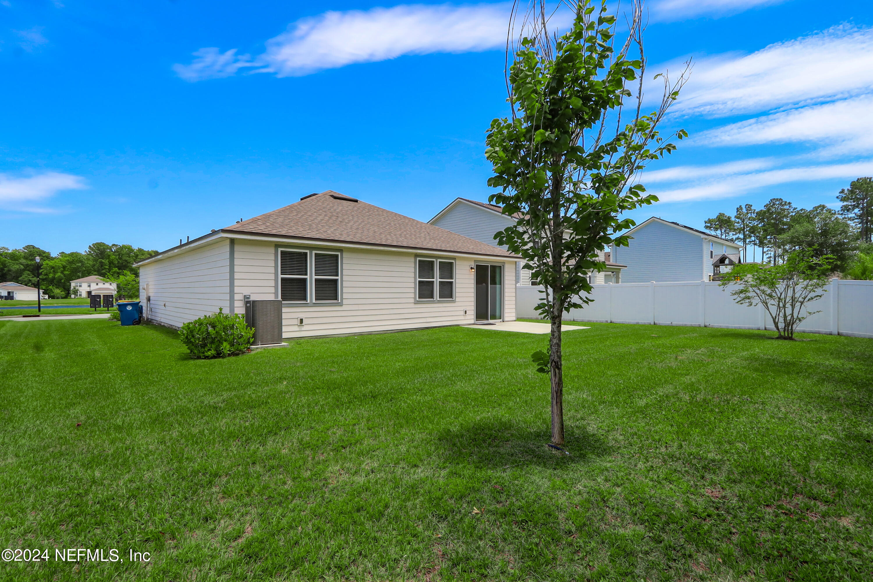 14454 Spring Light Circle Jacksonville, FL 32226 - Photo 37 of 37 a view of a house with a yard