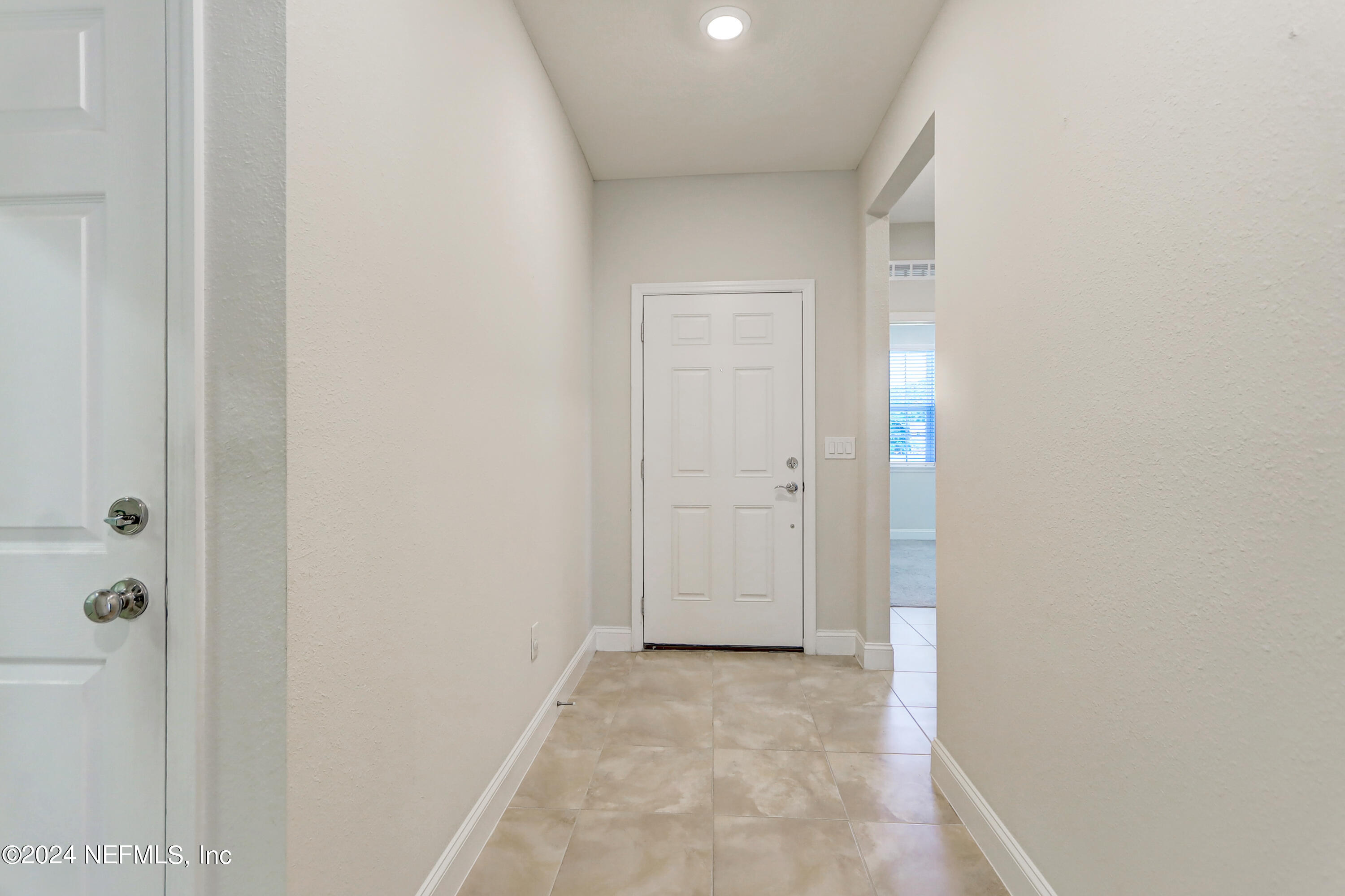 14454 Spring Light Circle Jacksonville, FL 32226 - Photo 7 of 37 a view of a room with a hallway