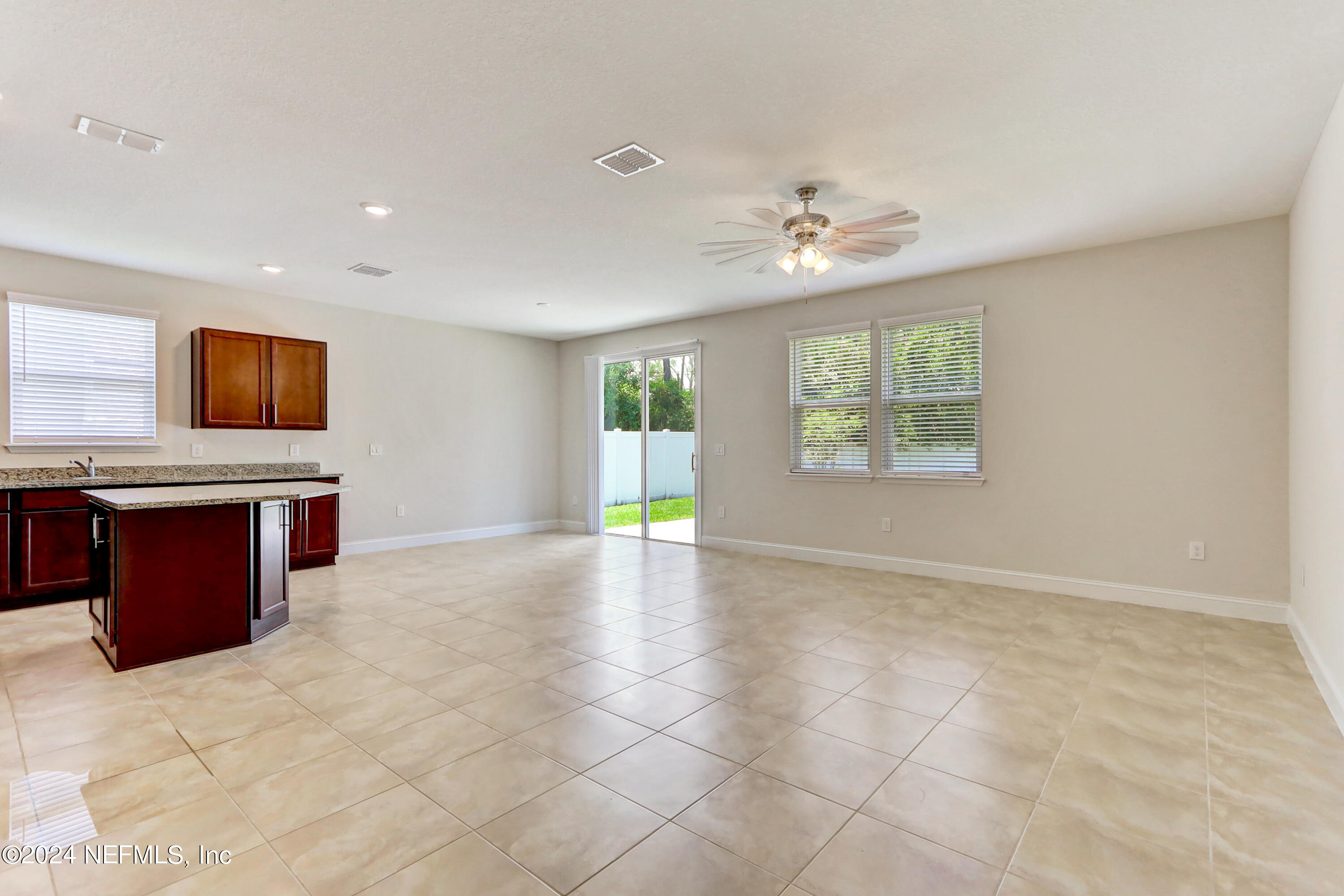 14454 Spring Light Circle Jacksonville, FL 32226 - Photo 9 of 37 a view of an empty room with a window