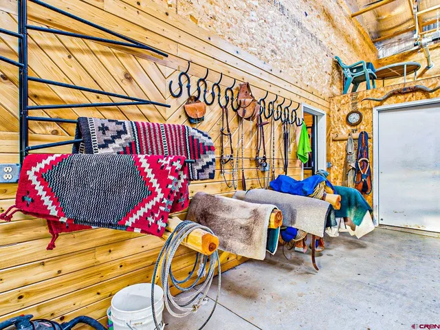 a view of a garage with a car parked