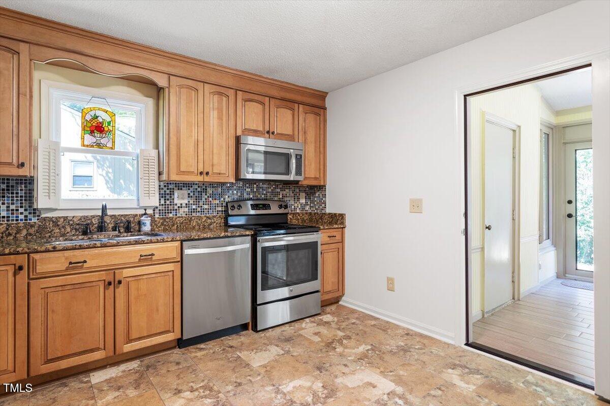 7911 Yester Court Raleigh, NC 27615 - Photo 14 of 33 Stainless Appliances
