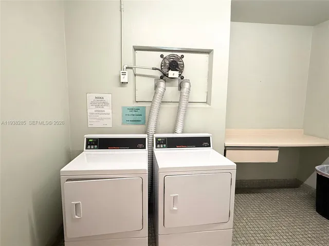 a view of a swimming pool with a trees