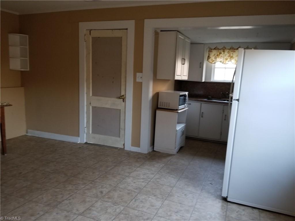 1074 Locust Grove Road Westfield, NC 27053 - Photo 11 of 21 Another view of kitchen facing back door