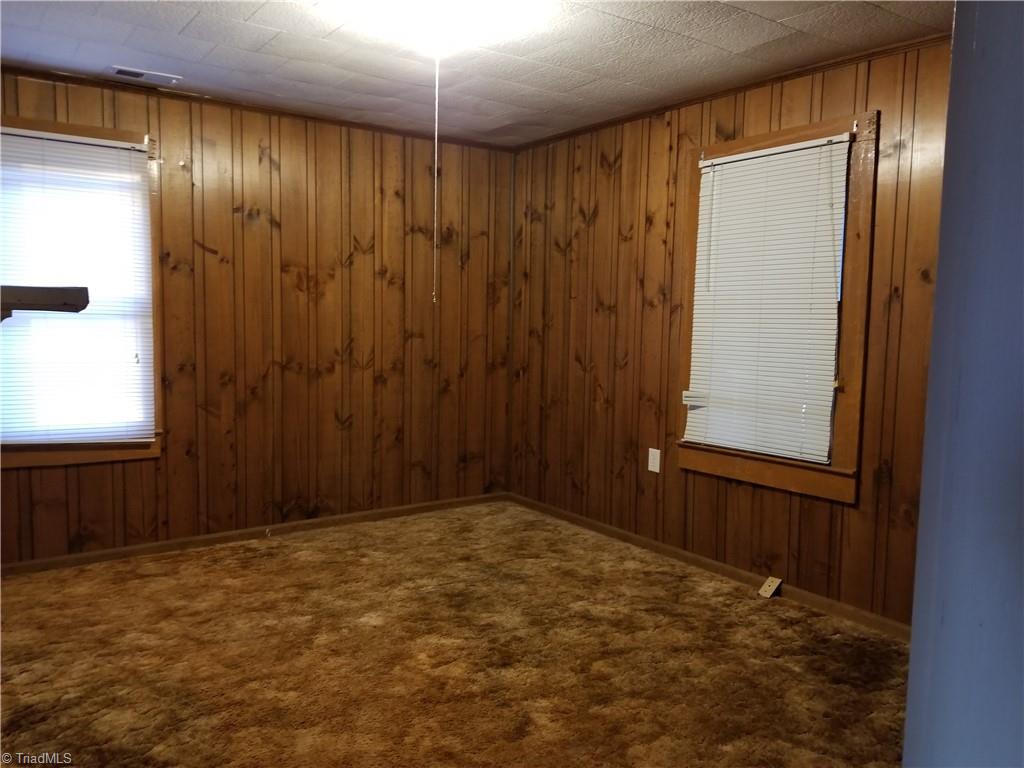 1074 Locust Grove Road Westfield, NC 27053 - Photo 15 of 21 Main level primary bedroom
