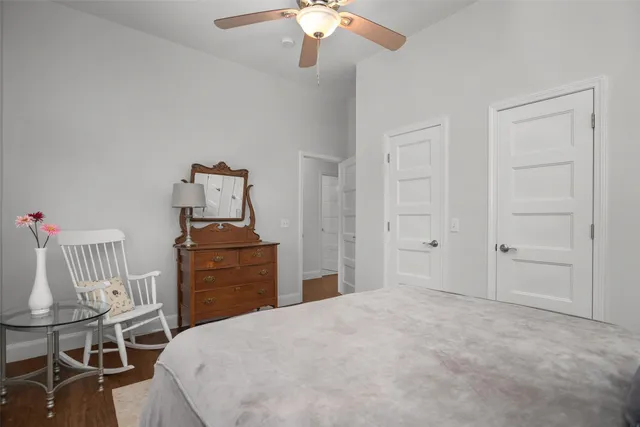 a bedroom with a bed and furniture