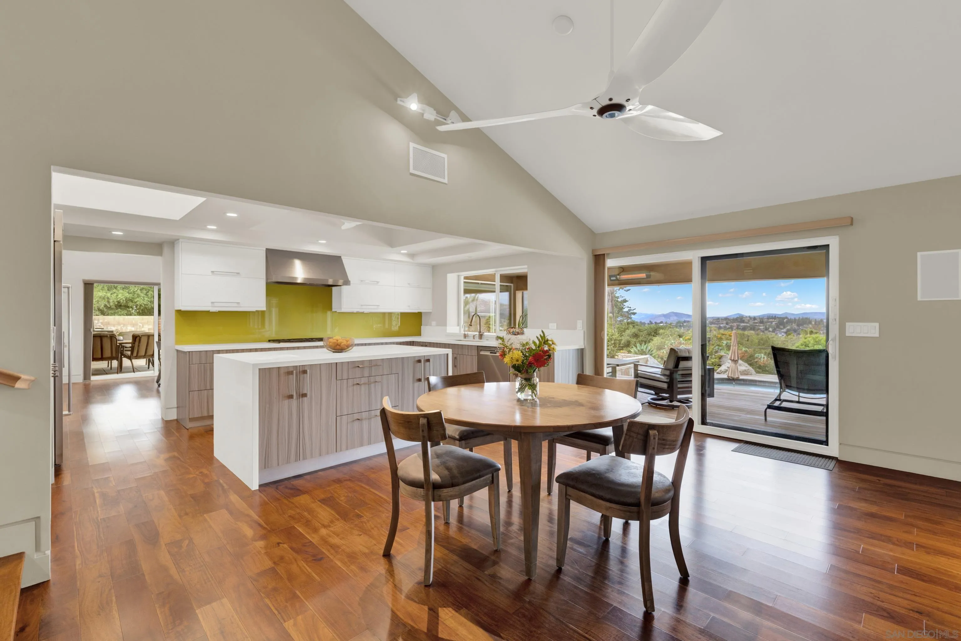 16117 Martincoit Road Poway, CA 92064 - Photo 13 of 73 a view of a dining room with furniture and wooden floor