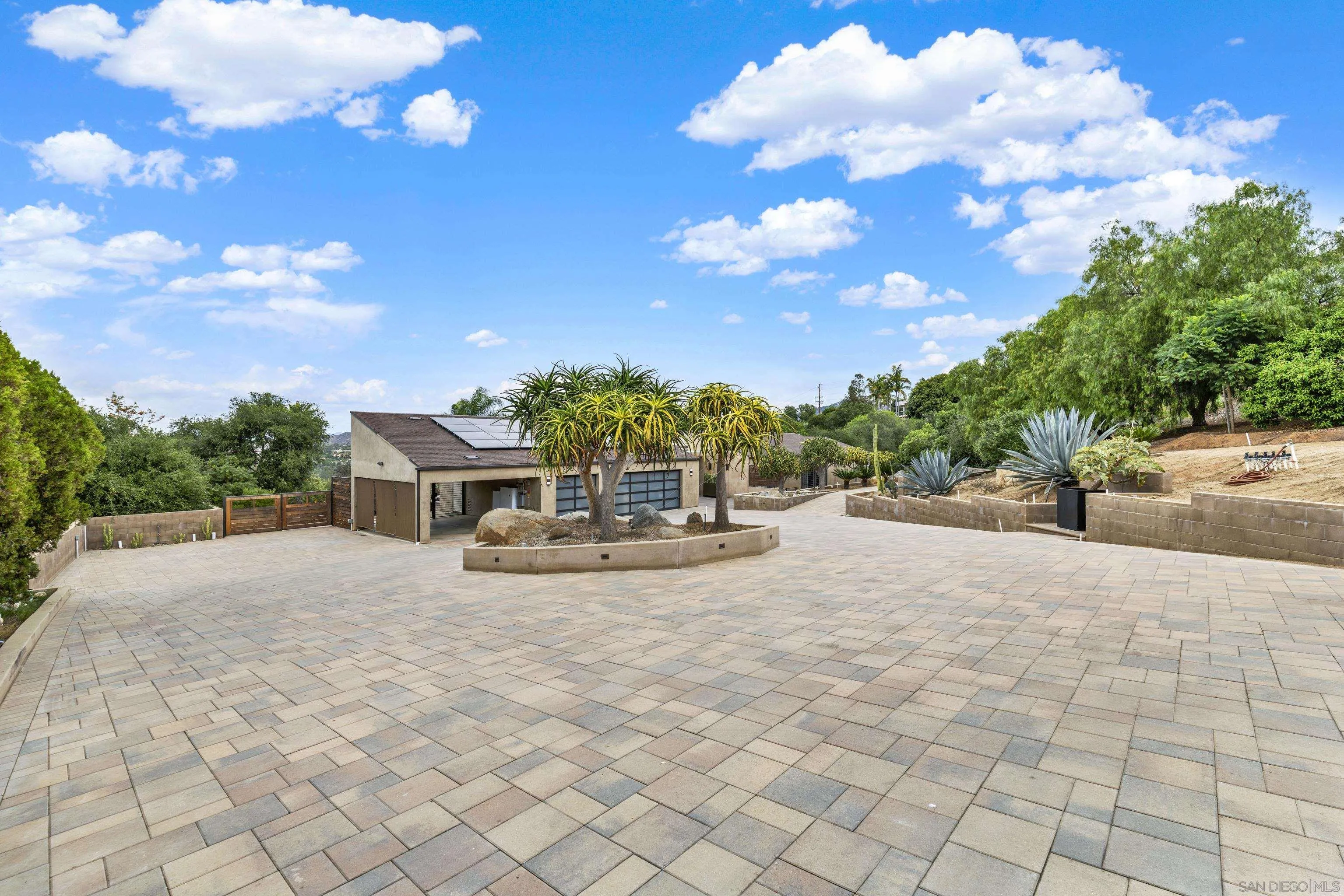 16117 Martincoit Road Poway, CA 92064 - Photo 2 of 73 a view of a house with yard and sitting area