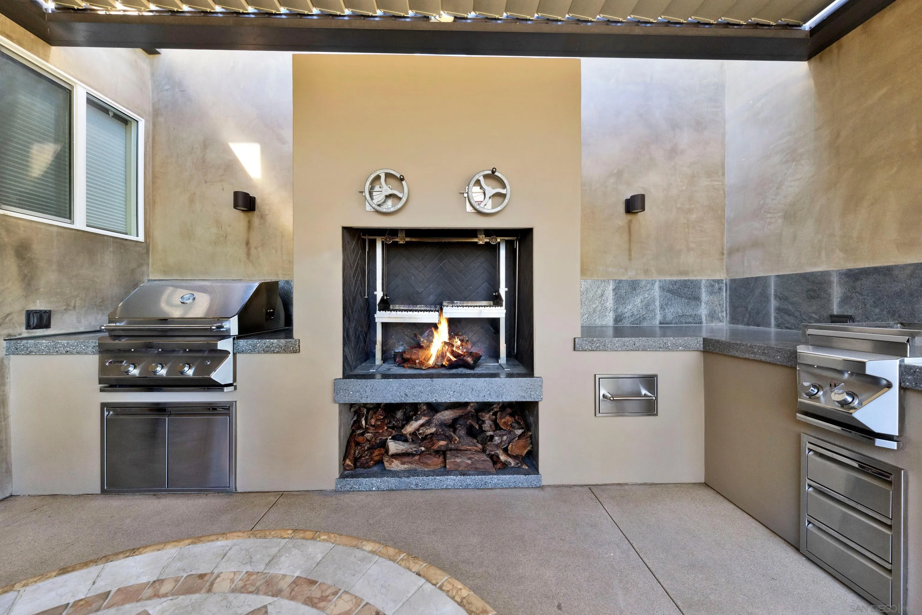 16117 Martincoit Road Poway, CA 92064 - Photo 63 of 73 a kitchen with stainless steel appliances granite countertop a refrigerator and stove