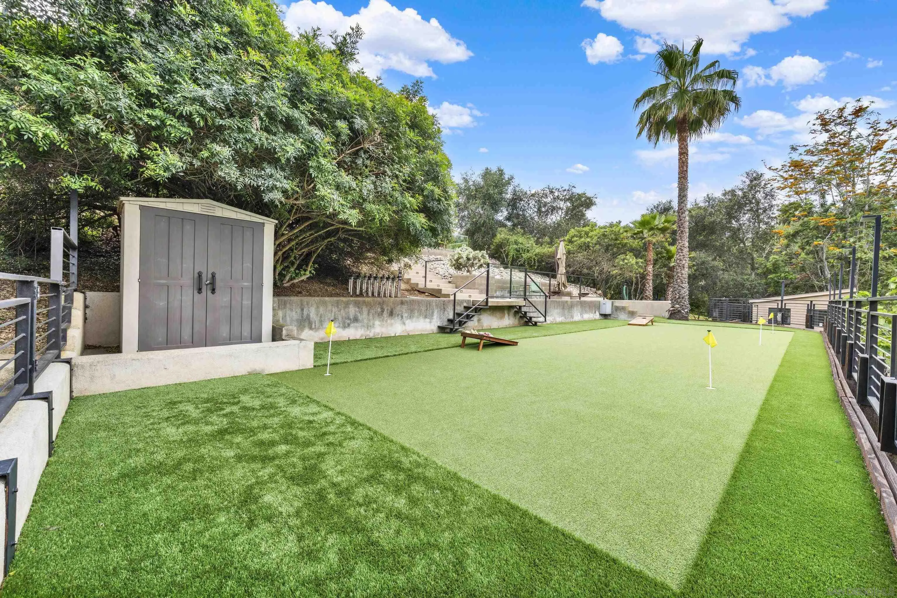 16117 Martincoit Road Poway, CA 92064 - Photo 67 of 73 a view of a backyard with a garden and plants