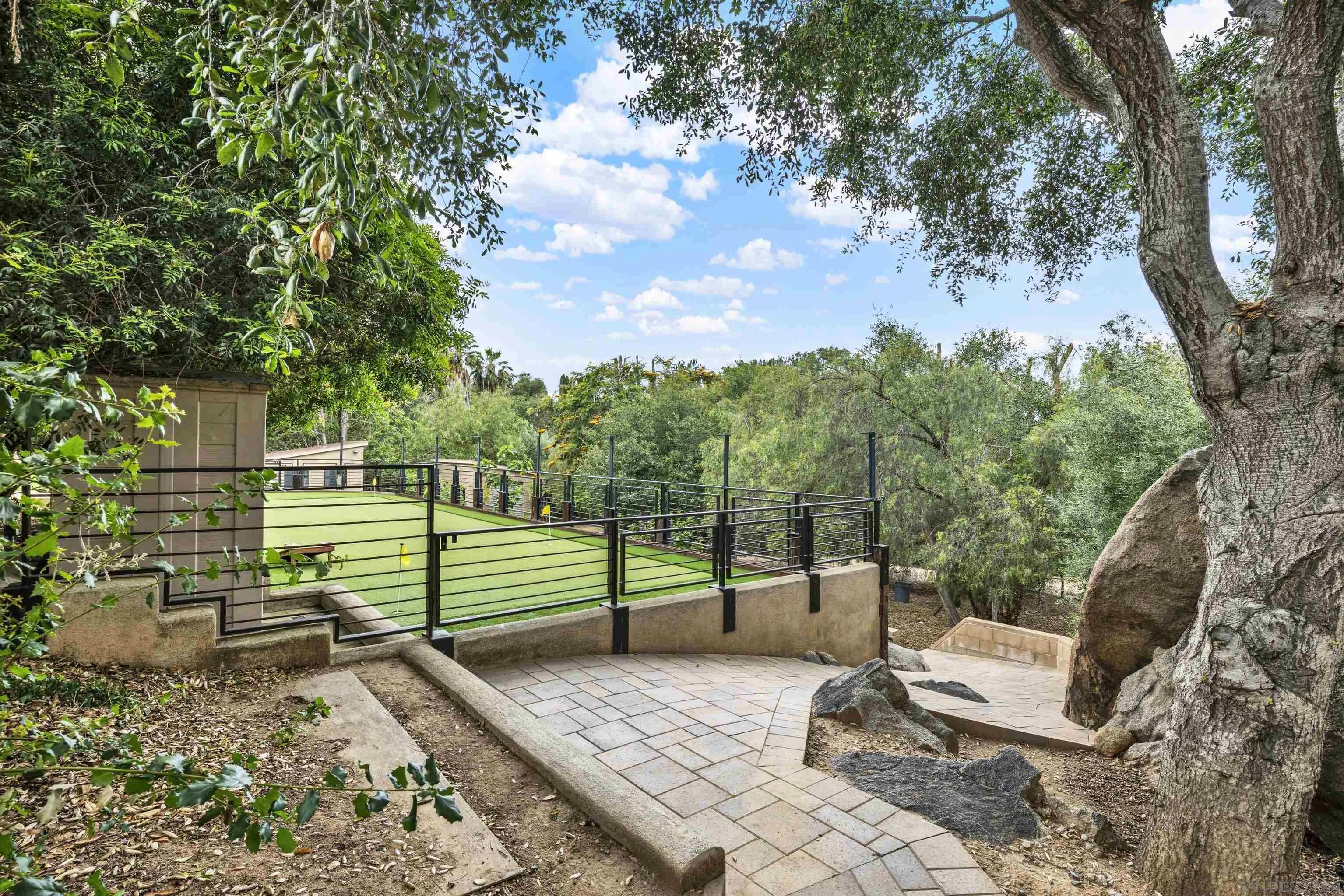 16117 Martincoit Road Poway, CA 92064 - Photo 73 of 73 a view of a bench in a backyard
