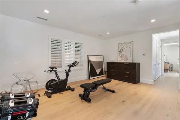 a room with furniture and a flat screen tv
