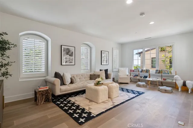 a living room with furniture or couch and a window