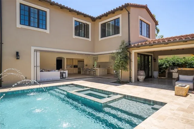 a front view of house with yard outdoor seating and dining space