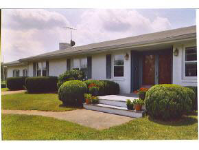 2905 Shutterlee Mill Road Staunton, VA 24401 - Photo 1 of 3 a front view of a house with a garden