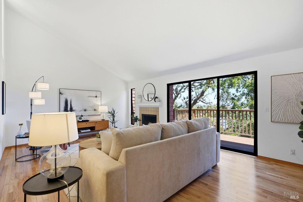 808 Arlene Way Novato, CA 94947 - Photo 2 of 45 Oversized sliding glass doors seamlessly connect the indoor living space to the expansive upper deck...