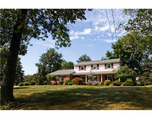 118 Ridgeview Drive Venetia, PA 15367 - Photo 1 of 15 Exterior Front. One owner custom...situated on a knoll...surrounded by mature trees and lush landscaping...side entry garages