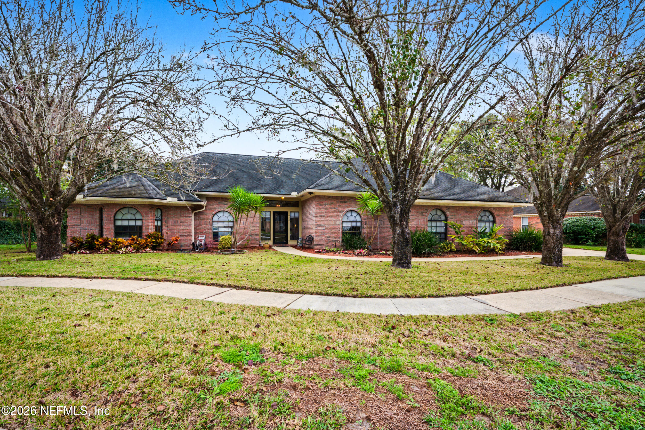 a house view with a garden space