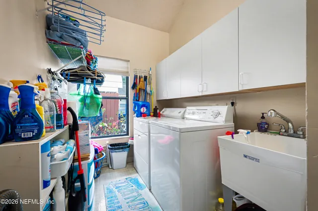a utility room with dryer and washer
