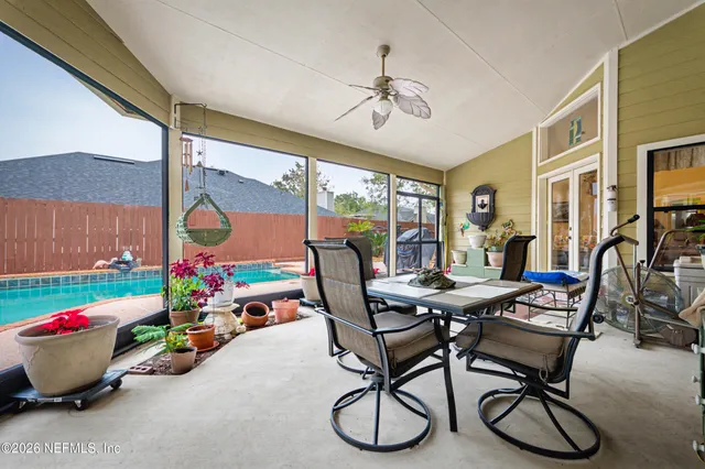 a play room with furniture and window
