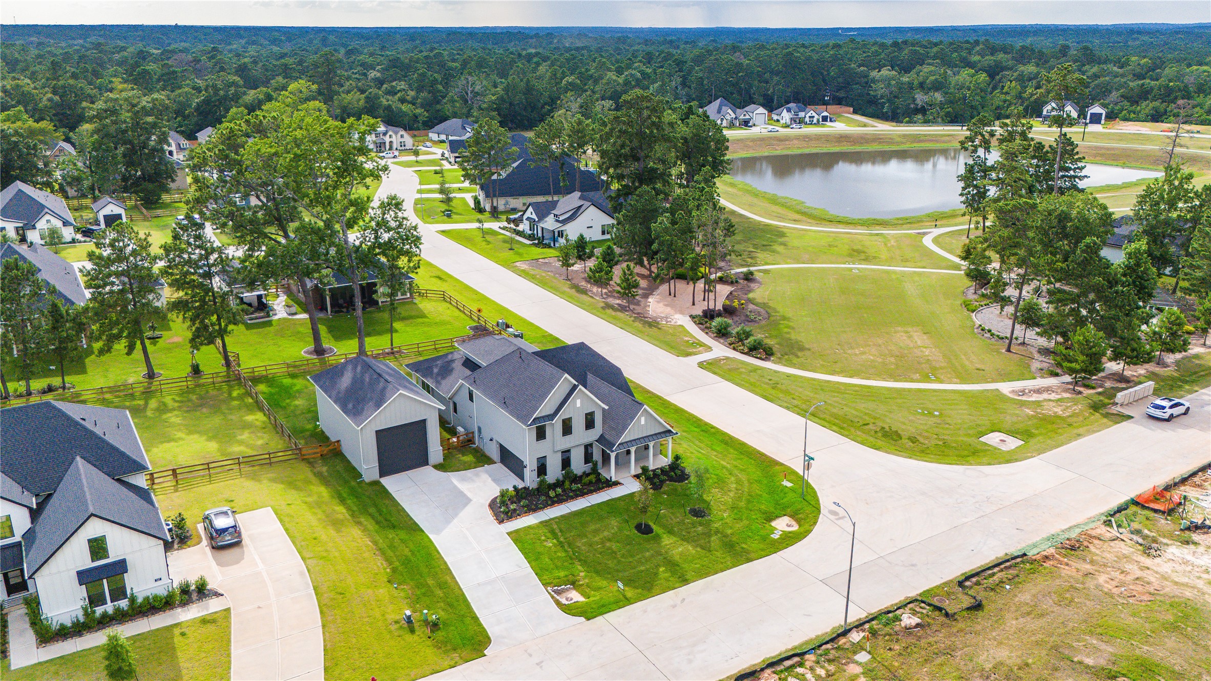 551 Black Bronco Road Magnolia, TX 77354 - Photo 4 of 50 Aerial of 551 Black Bronco located on a corner lot and directly across from the community trails and lake.