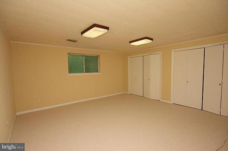 12707 Barbara Road Silver Spring, MD 20906 - Photo 18 of 21 a view of an empty room