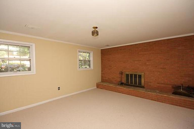 12707 Barbara Road Silver Spring, MD 20906 - Photo 9 of 21 an empty room with windows