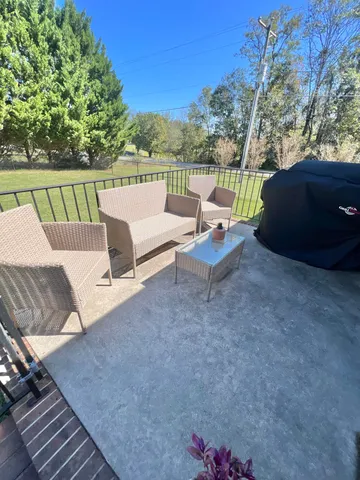 a view of a couches in the roof deck