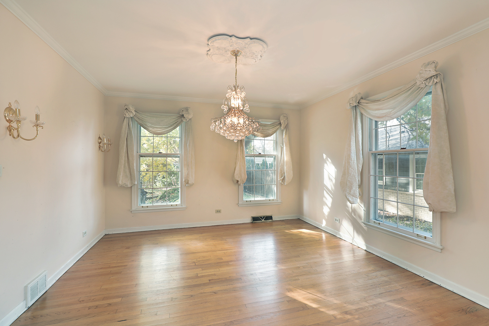 3815 Bordeaux Drive Northbrook, IL 60062 - Photo 11 of 56 a view of an empty room with wooden floor and a window