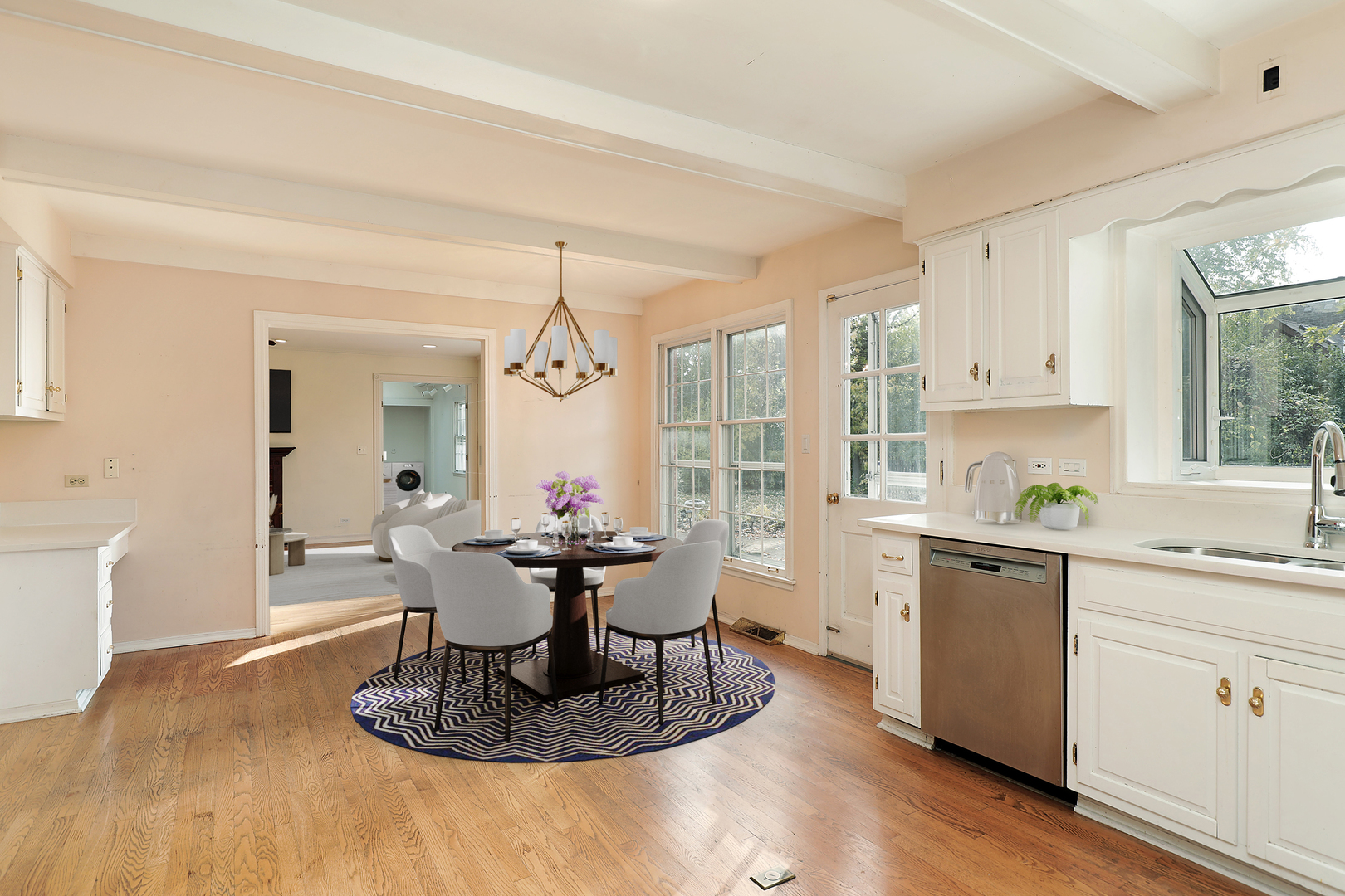 3815 Bordeaux Drive Northbrook, IL 60062 - Photo 12 of 56 a kitchen with a table and chairs