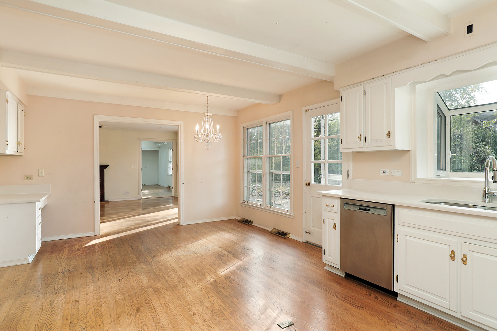 3815 Bordeaux Drive Northbrook, IL 60062 - Photo 13 of 56 a view of a kitchen with wooden floor and a sink