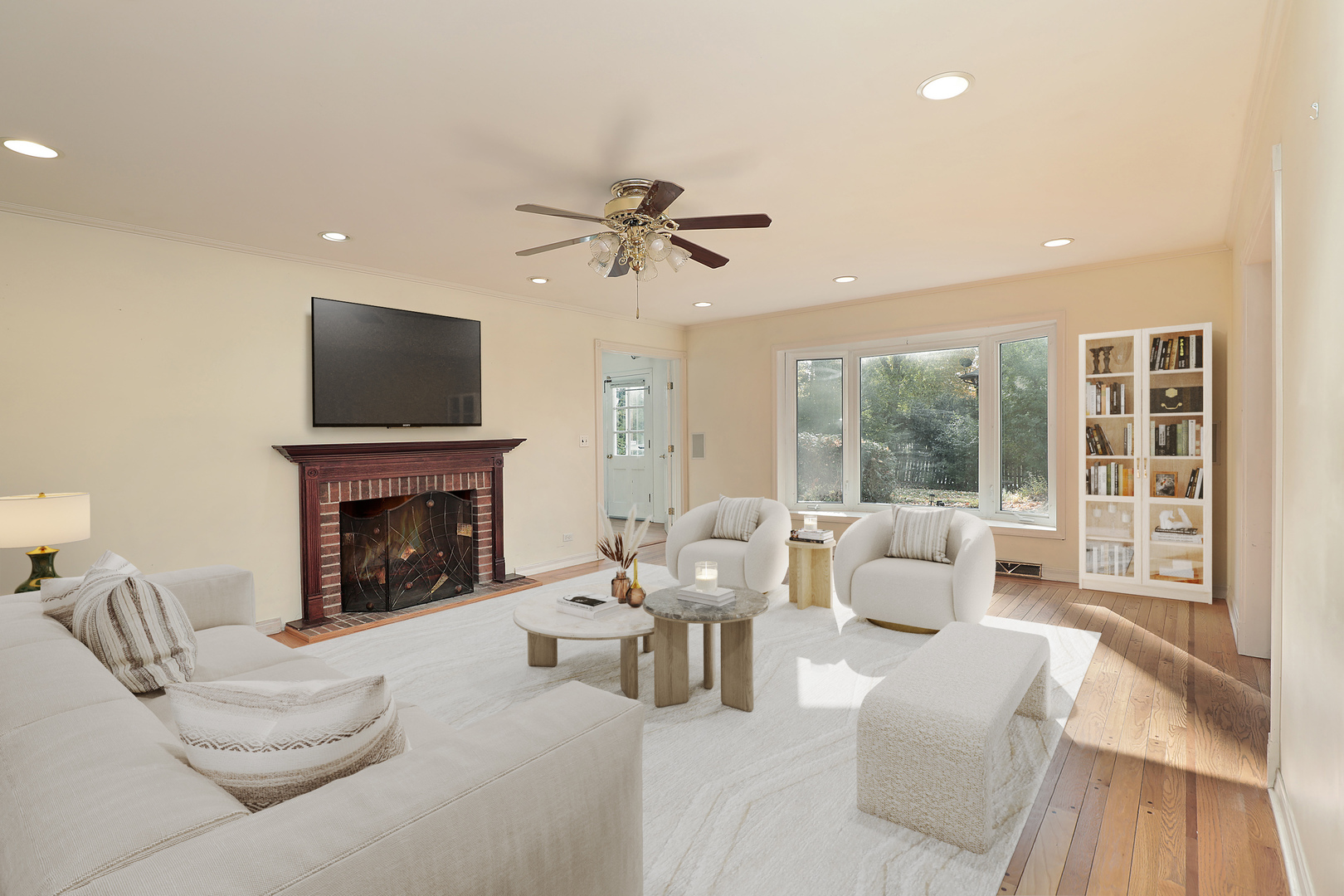 3815 Bordeaux Drive Northbrook, IL 60062 - Photo 16 of 56 a living room with furniture a fireplace and a flat screen tv