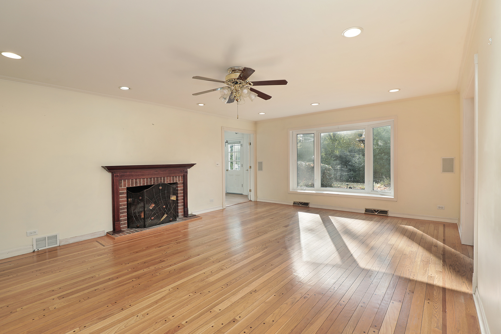 3815 Bordeaux Drive Northbrook, IL 60062 - Photo 17 of 56 a view of an empty room with a window and a kitchen