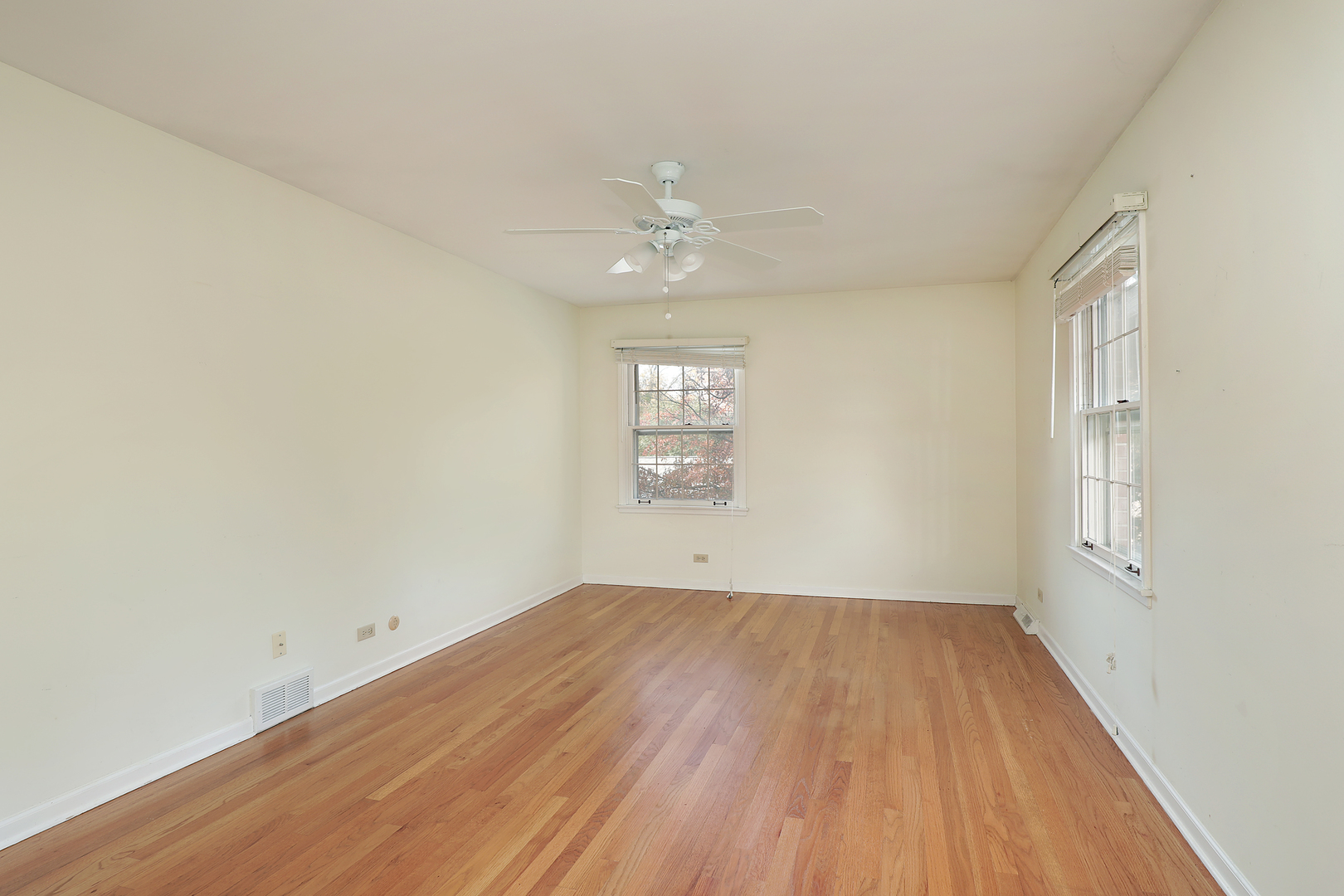 3815 Bordeaux Drive Northbrook, IL 60062 - Photo 24 of 56 wooden floor in an empty room with a window