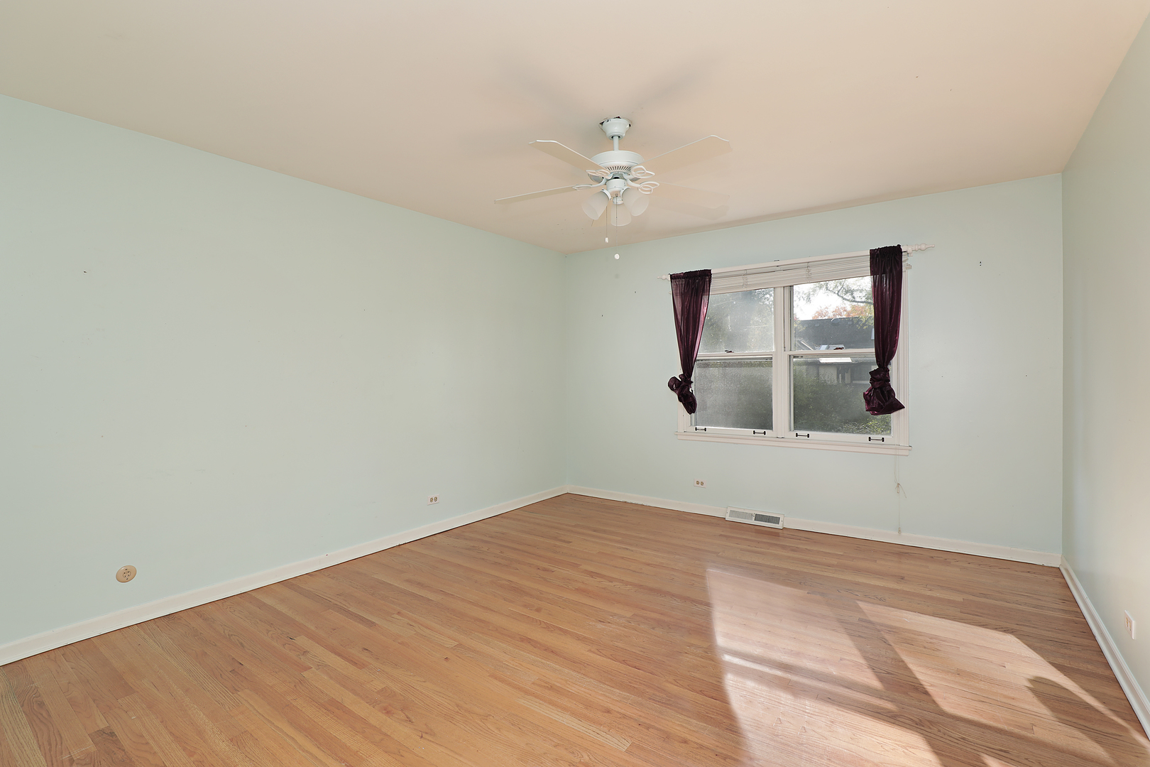 3815 Bordeaux Drive Northbrook, IL 60062 - Photo 26 of 56 wooden floor in an empty room with a window