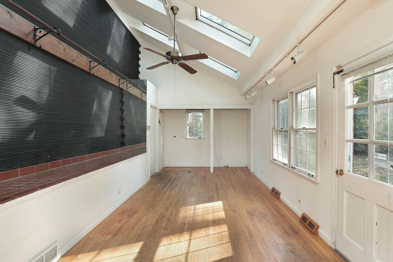 3815 Bordeaux Drive Northbrook, IL 60062 - Photo 35 of 56 a view of empty room with wooden floor and fan