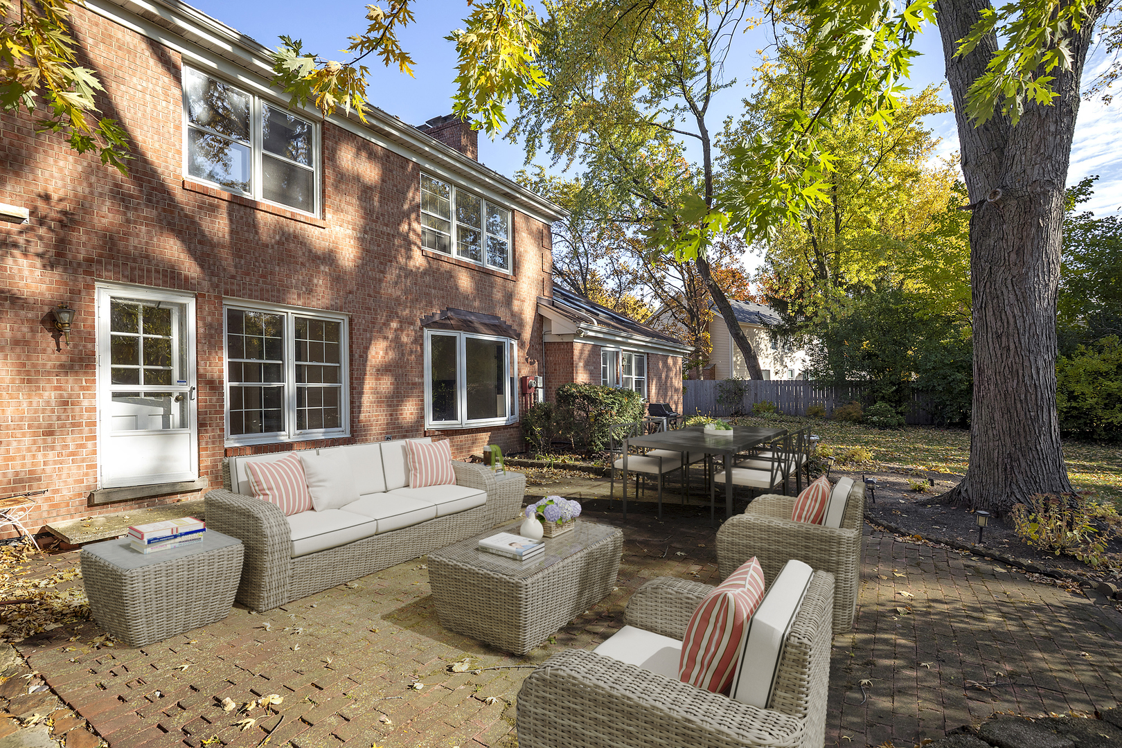 3815 Bordeaux Drive Northbrook, IL 60062 - Photo 36 of 56 a view of a patio with couches chairs and potted plants