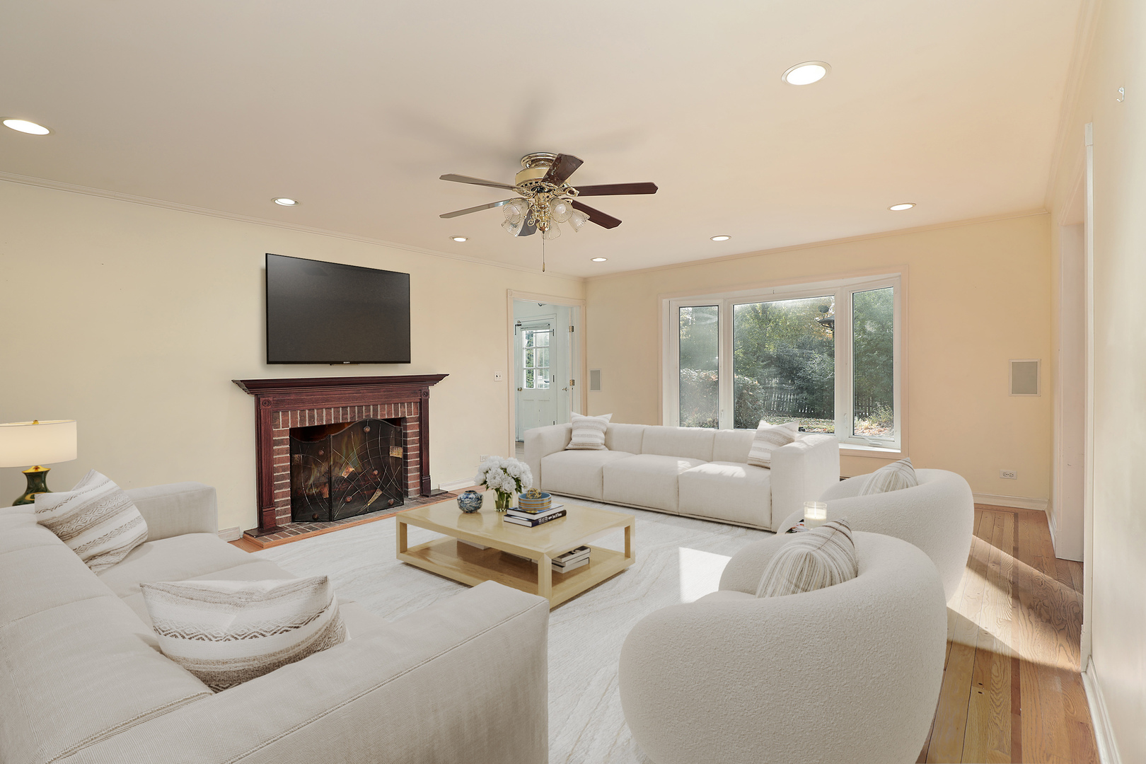 3815 Bordeaux Drive Northbrook, IL 60062 - Photo 45 of 56 a living room with furniture a fireplace and a flat screen tv